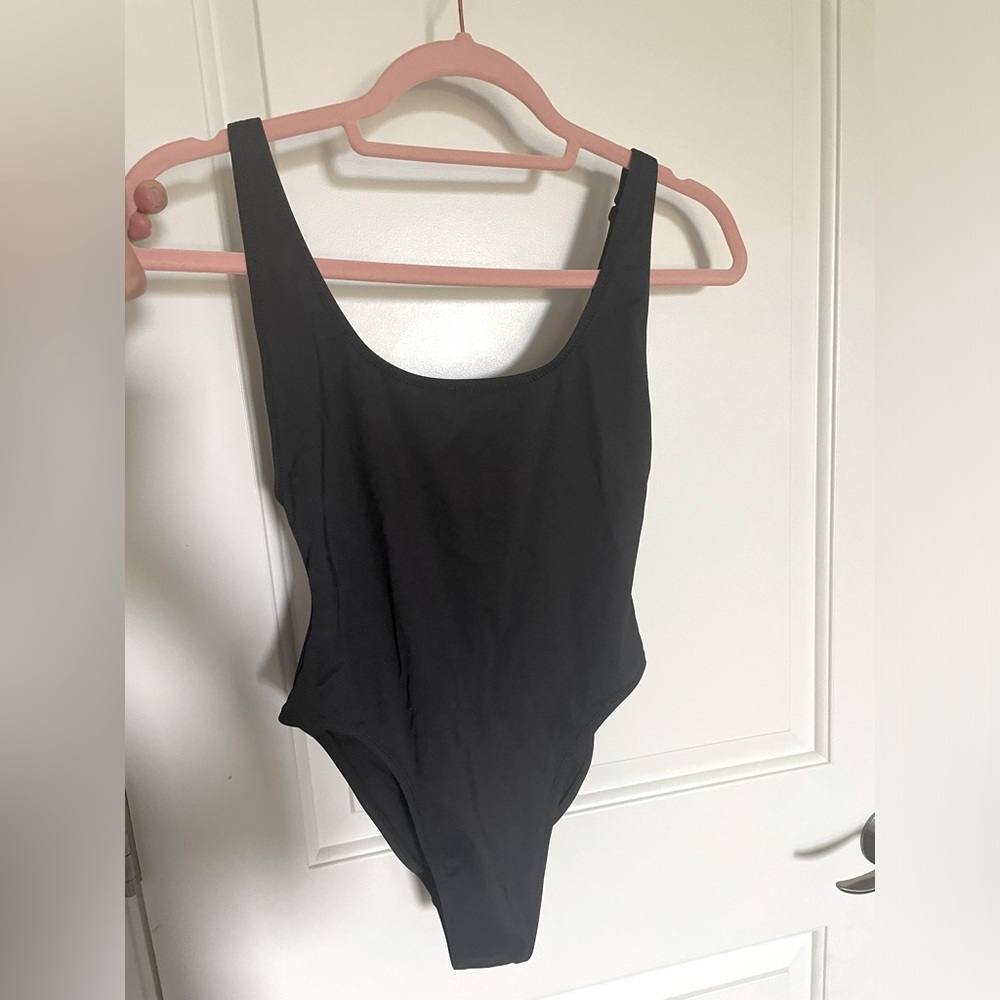 Brand new - One piece SKIMS swimsuit in Onyx ( Black ) color Small size